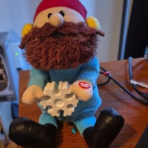 Gemmy Festive Plush with Red Hat and Blue Outfit